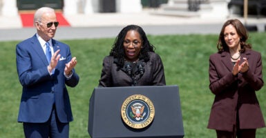 Ketanji Brown Jackson speaks between President Joe Biden and Vice President Kamala Harris