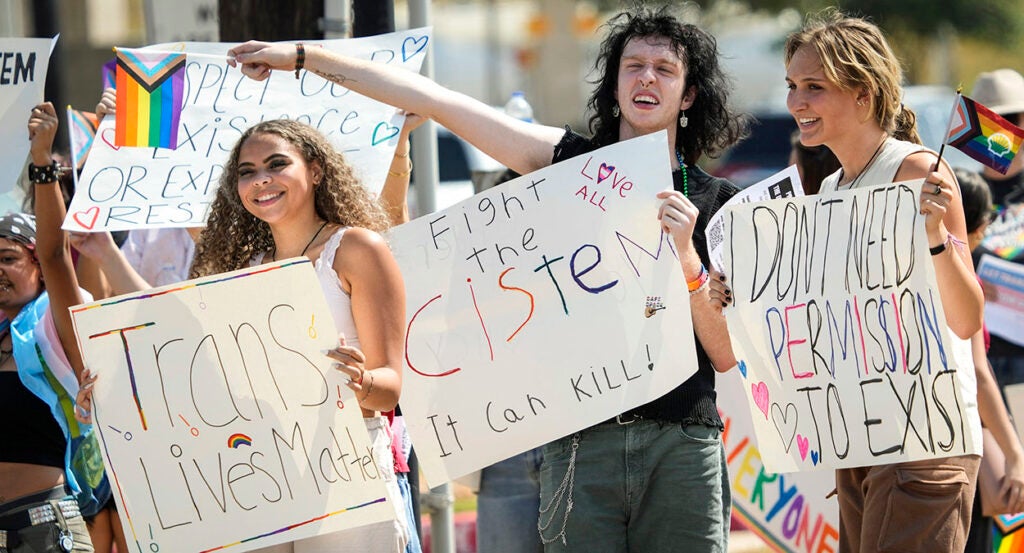 Protests with transgender signs