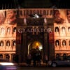 The front of the TCL Chinese Theatre in Hollywood at night, decorated to look like the Roman Colosseum.