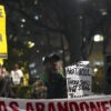 Activist groups protest the death of Jordan Neely in New York City, one holding a large, yellow sign that reads, "Justice for Jordan Neely."