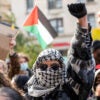 Students Protesting with a Palestinian flag