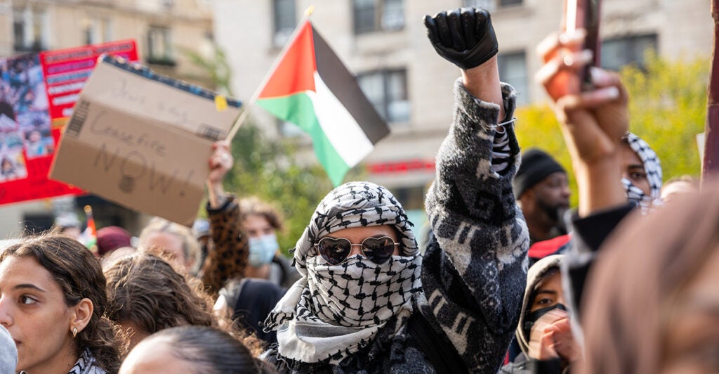 Students Protesting with a Palestinian flag