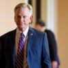 Sen. Tommy Tuberville walks the halls of Congress.