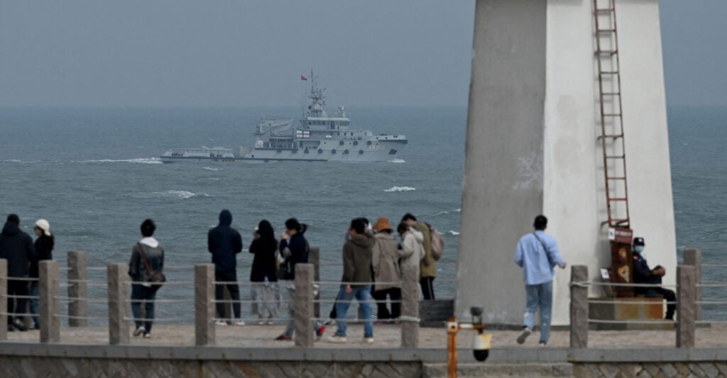 A Chinese navy tugboat sails in the Taiwan Strait.