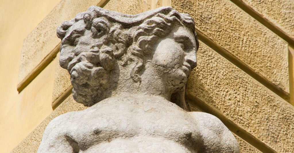 A sculpture of the ancient Roman god Janus in Reggio Emilia, Italy