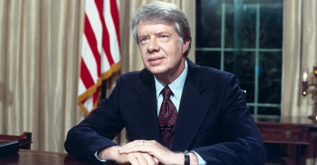 President Jimmy Carter at his desk in the Oval Office on April 18, 1977.