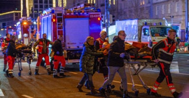 Ambulance crews ferry the injured on stretchers away after a terrorist attack on Dec. 20 in Magdeburg, Germany.