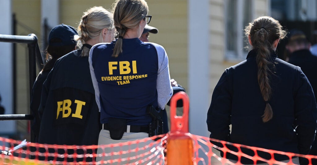 Agents wear FBI uniforms and investigate