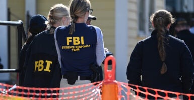 Agents wear FBI uniforms and investigate