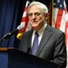 Attorney General Merrick Garland behind a lectern