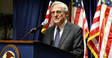 Attorney General Merrick Garland behind a lectern