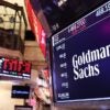 An electronic Goldman Sachs sign hangs in the New York Stock Exchange.