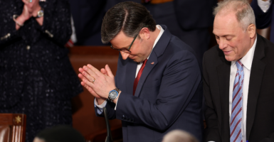 With a fellow Louisiana Republican, Rep. Steve Scalise, looking on, Rep. Mike Johnson reacts after being nominated for another term as speaker of the House.