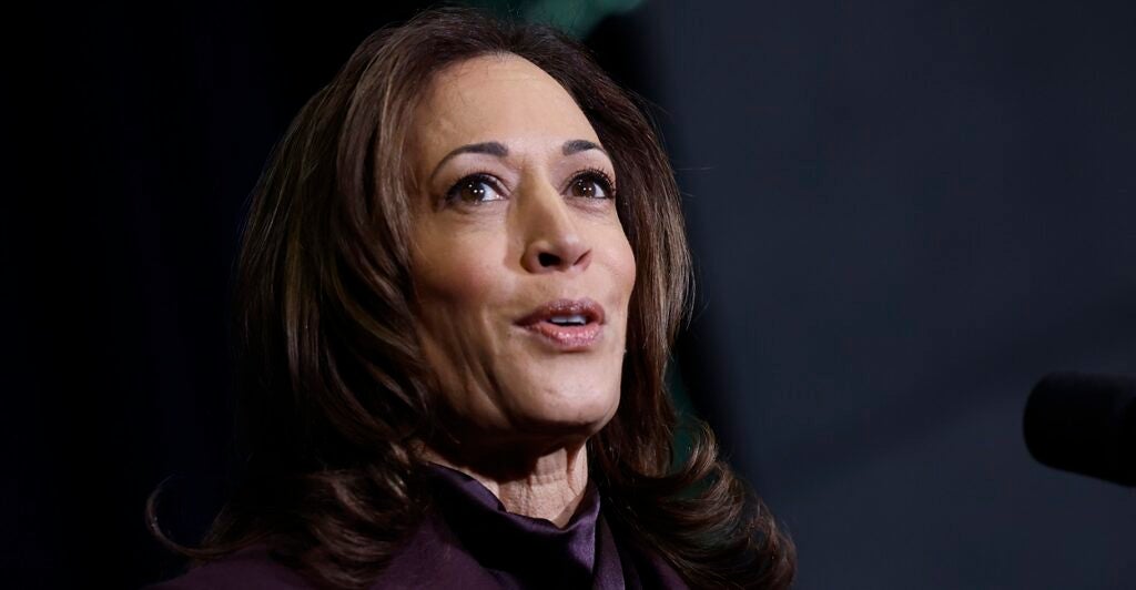 Kamala Harris looks up while speaking.