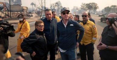 Los Angeles Mayor Karen Bass stands to the left of California Gov. Gavin Newsom.