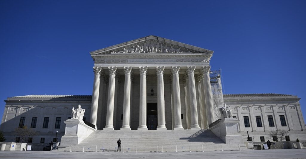 A picture of the United States Supreme Court building during the day.