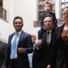 Elon Musk and Vivek Ramaswamy in suits