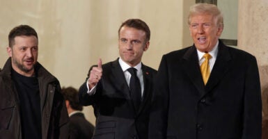 Ukrainian President Volodymyr Zelenskyy, French President Emmanuel Macron, and President-elect Donald Trump outside the French presidential palace