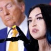 President Donald Trump listens as Alexis Nungaray, mother of 12-year-old Jocelyn Nungaray, speaks at the Austin-Bergstrom International Airport in Austin, Texas, on Oct. 25.