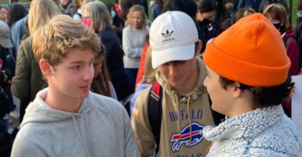 Students and families gather with Sean Ade to protest Wellesley Public Schools handling of bullying incidents. Photo courtesy of Allyson Ade.