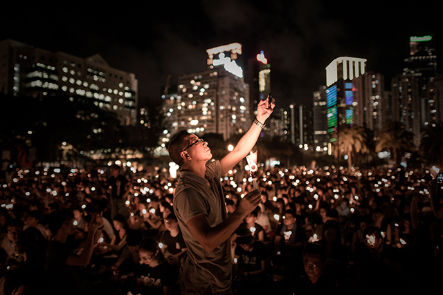 Around 200,000 people were set to take part in a candlelight vigil in Hong Kong on June 4 to commemorate the 25th anniversary. (Photo: Newscom)